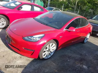 2018 Tesla Model 3 Long Range Battery with VIN 5YJ3E1EA5JF063555, listed as a IAAI auction lot 42028785 with 45,346 mi miles and . Bid and sale history available at DreamBid. Image 2.