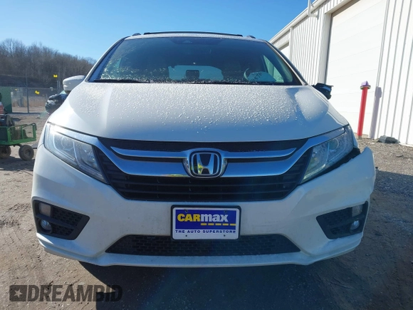 2018 Honda Odyssey EX-L with VIN 5FNRL6H75JB044422, listed as a IAAI auction lot 41730576 with 120,587 mi miles and . Bid and sale history available at DreamBid. Image 12.