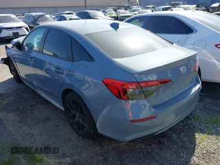 2023 Honda Civic Sport z VIN 2HGFE2F50PH556813, wystawiony jako IAAI lot #41364523 z przebiegiem 8 999 mil mil oraz . Historia ofert i sprzedaży dostępna na DreamBid. Obrazek 3.