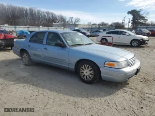 2005 Ford Crown Victoria LX with VIN 2FAFP74W65X168866, listed as a Copart auction lot 47220335 with 163,973 mi miles and Salvage Title. Bid and sale history available at carsss.com. Image 4.