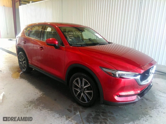 2017 Mazda CX-5 Grand Touring with VIN JM3KFBDL6H0199064, listed as a IAAI auction lot 36330036 with 40,929 mi miles. Bid and sale history available at carsss.com. Image 1.