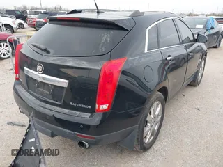 2011 Cadillac SRX Performance Collection with VIN 3GYFNBEY9BS625623, listed as a IAAI auction lot 41731357 with 163,245 mi miles. Bid and sale history available at carsss.com. Image 4.