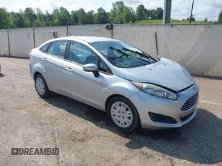 2016 Ford Fiesta S z VIN 3FADP4AJ6GM123343, wystawiony jako IAAI lot #42136294 z przebiegiem 100 206 mil mil oraz . Historia ofert i sprzedaży dostępna na DreamBid. Obrazek 1.