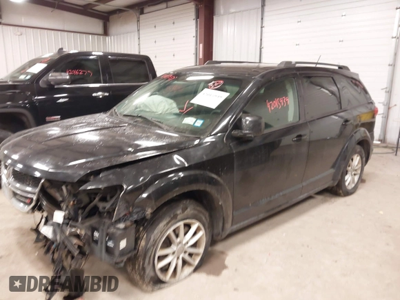 2013 Dodge Journey SXT with VIN 3C4PDDBGXDT571489, listed as a IAAI auction lot 42015939 with 206,550 mi miles and . Bid and sale history available at DreamBid. Image 2.