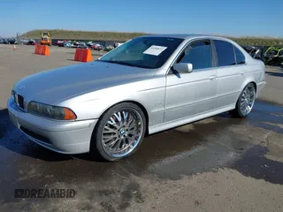 2003 BMW 5 Series 525i with VIN WBADT33473GF43821, listed as a IAAI auction lot 41450822 with 165,062 mi miles. Bid and sale history available at carsss.com. Image 2.