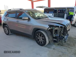 2015 Jeep Cherokee Latitude with VIN 1C4PJLCB1FW770806, listed as a IAAI auction lot 41887226 with 71,268 mi miles and . Bid and sale history available at DreamBid. Image 13.