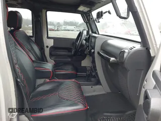 2007 Jeep Wrangler Unlimited X with VIN 1J4GA391X7L107424, listed as a IAAI auction lot 41752013 with 196,557 mi miles and . Bid and sale history available at DreamBid. Image 5.