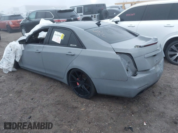 2014 Cadillac CTS Luxury AWD with VIN 1G6AX5SX0E0148876, listed as a IAAI auction lot 41134364 with Not Provided miles and . Bid and sale history available at DreamBid. Image 3.