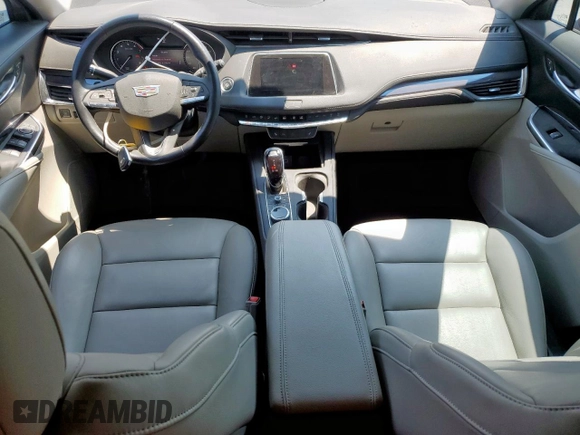 2023 Cadillac XT4 FWD Luxury z VIN 1GYAZAR42PF102696, wystawiony jako Copart lot #60524065 z przebiegiem 1 903 mil mil oraz Szkoda całkowita • Salvage title. Historia ofert i sprzedaży dostępna na DreamBid. Obrazek 8.