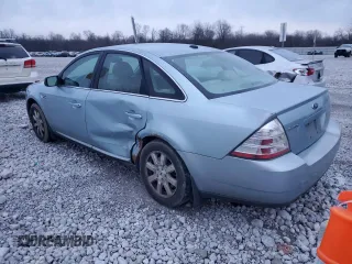 2009 Ford Taurus SE with VIN 1FAHP23W29G119995, listed as a Copart auction lot 82655984 with 155,112 mi miles and Salvage Title. Bid and sale history available at carsss.com. Image 2.
