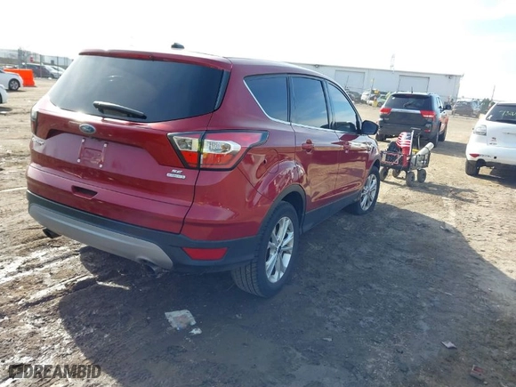 2017 Ford Escape SE with VIN 1FMCU0GD5HUB46016, listed as a IAAI auction lot 41776549 with 163,081 mi miles. Bid and sale history available at carsss.com. Image 4.