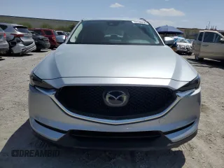 2018 Mazda CX-5 Grand Touring with VIN JM3KFBDM0J0377243, listed as a Copart auction lot 62199295 with 37,930 mi miles and Salvage title. Bid and sale history available at DreamBid. Image 5.