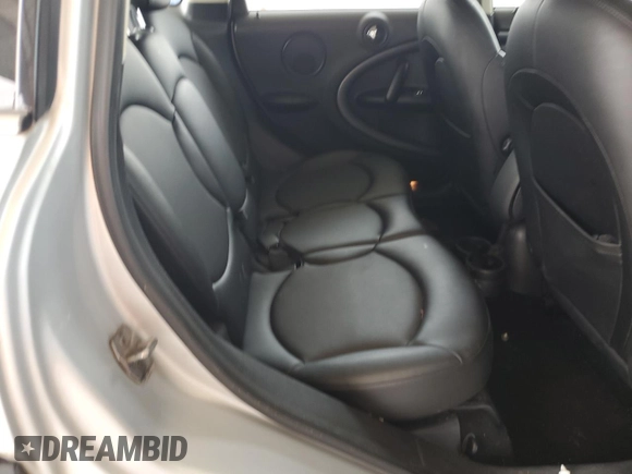 2014 MINI Countryman S with VIN WMWZC3C56EWP29211, listed as a Copart auction lot 52521145 with 91,396 mi miles and Salvage title. Bid and sale history available at DreamBid. Image 10.