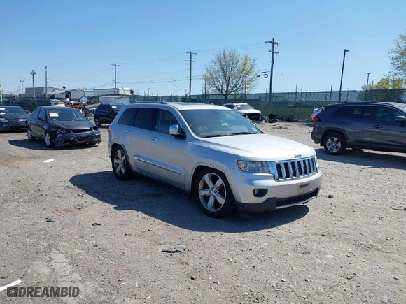 2011 Jeep Grand Cherokee Overland with VIN 1J4RR6GT6BC568491, listed as a IAAI auction lot 42035464 with 147,389 mi miles. Bid and sale history available at carsss.com. Image 1.
