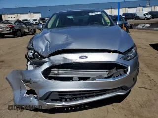 2020 Ford Fusion SE z VIN 3FA6P0T93LR179435, wystawiony jako Copart lot #56985465 z przebiegiem 43 188 mil mil oraz Szkoda całkowita • Salvage title. Historia ofert i sprzedaży dostępna na DreamBid. Obrazek 5.