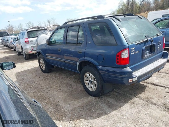 2002 Isuzu Rodeo S with VIN 4S2CK58W124320988, listed as a IAAI auction lot 41921874 with 227,320 mi miles. Bid and sale history available at carsss.com. Image 3.