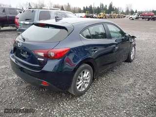 2016 Mazda Mazda3 i Grand Touring with VIN JM1BM1N73G1337274, listed as a IAAI auction lot 41851662 with 44,160 mi miles. Bid and sale history available at carsss.com. Image 4.