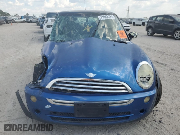 2006 MINI Hardtop with VIN WMWRC33566TK15023, listed as a Copart auction lot 76392014 with Not provided miles and Salvage title. Bid and sale history available at DreamBid. Image 5.