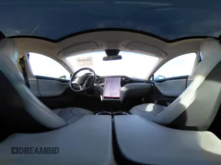 2014 Tesla Model S 60 with VIN 5YJSA1H13EFP62451, listed as a IAAI auction lot 41639068 with 88,000 mi miles and . Bid and sale history available at DreamBid. Image 22.