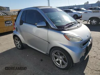 2009 Smart fortwo Passion with VIN WMEEK31X49K302911, listed as a Copart auction lot 63496915 with 44,047 mi miles and Salvage title. Bid and sale history available at DreamBid. Image 4.