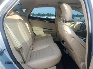 2013 Ford Fusion SE Hybrid z VIN 3FA6P0LU7DR368711, wystawiony jako Copart lot #62367685 z przebiegiem 155 284 mil mil oraz Czysty tytuł • Clean title. Historia ofert i sprzedaży dostępna na DreamBid. Obrazek 10.