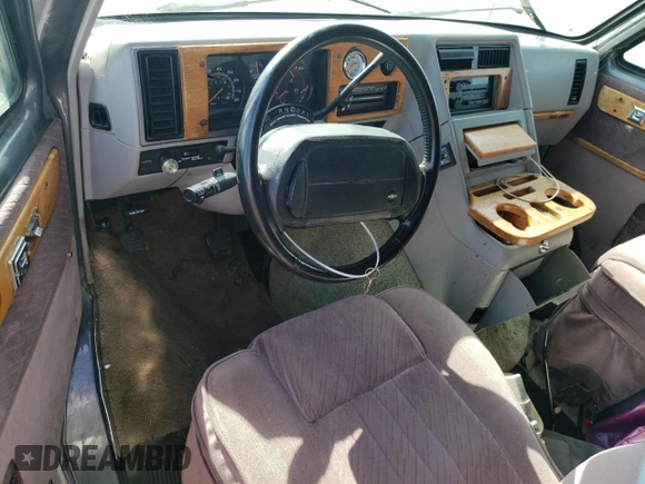 1994 Chevrolet Chevy Van с VIN 1GBEG25K5RF123489, выставлен на аукционе Copart как лот 79491854 с пробегом 82 970 миль миль и Списание • Salvage title. История ставок и продаж доступна на DreamBid. Изображение 8.