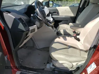2009 Mazda 5 Grand Touring with VIN JM1CR293990330860, listed as a Copart auction lot 71156854 with 250,187 mi miles and Salvage Title. Bid and sale history available at DreamBid. Image 7.