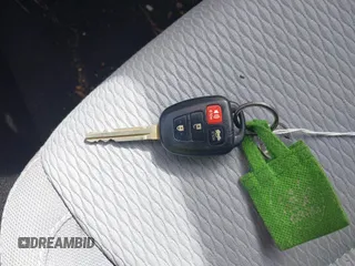 2016 Toyota Corolla L z VIN 5YFBURHE1GP398787, wystawiony jako IAAI lot #41667240 z przebiegiem 128 144 mil mil oraz . Historia ofert i sprzedaży dostępna na DreamBid. Obrazek 11.