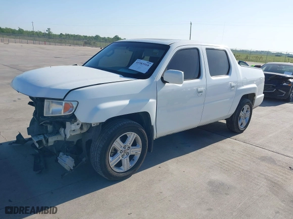 2010 Honda Ridgeline RTL with VIN 5FPYK1F54AB011339, listed as a IAAI auction lot 41983918 with 201,124 mi miles. Bid and sale history available at carsss.com. Image 20.