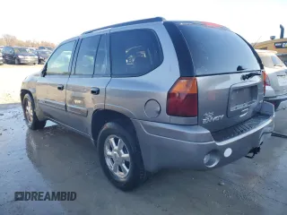 2005 GMC Envoy SLT with VIN 1GKDS13SX52322725, listed as a Copart auction lot 82032674 with 249,288 mi miles and Salvage Title. Bid and sale history available at carsss.com. Image 2.