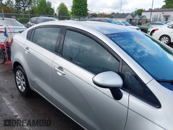 2014 Kia Rio LX with VIN KNADM4A31E6413780, listed as a IAAI auction lot 41996928 with 93,446 mi miles and . Bid and sale history available at DreamBid. Image 13.