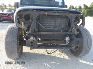 2014 Jeep Wrangler Unlimited Sport with VIN 1C4BJWDG5EL327225, listed as a IAAI auction lot 42547991 with 129,545 mi miles and . Bid and sale history available at DreamBid. Image 18.