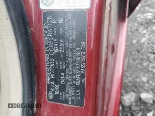 2007 Kia Spectra EX with VIN KNAFE121X75381938, listed as a Copart auction lot 74341004 with 118,890 mi miles and Salvage Title. Bid and sale history available at carsss.com. Image 12.