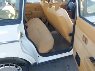 1990 Volvo 240 z VIN YV1AA8846L1429028, wystawiony jako IAAI lot #41370630 z przebiegiem 132 354 mil mil oraz . Historia ofert i sprzedaży dostępna na DreamBid. Obrazek 8.