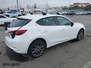 2018 Mazda Mazda3 5-Door Grand Touring with VIN 3MZBN1M33JM169834, listed as a IAAI auction lot 41867369 with 94,198 mi miles. Bid and sale history available at carsss.com. Image 4.
