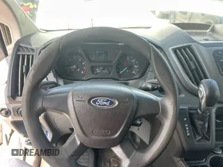 2016 Ford Transit Cargo with VIN 1FTYE1YM2GKB48795, listed as a IAAI auction lot 42854425 with 198,381 mi miles and . Bid and sale history available at DreamBid. Image 17.