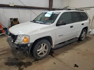 2004 GMC Envoy SLT with VIN 1GKDT13S042257444, listed as a Copart auction lot 89137605 with 301,920 mi miles and Salvage Title. Bid and sale history available at carsss.com. Image 1.
