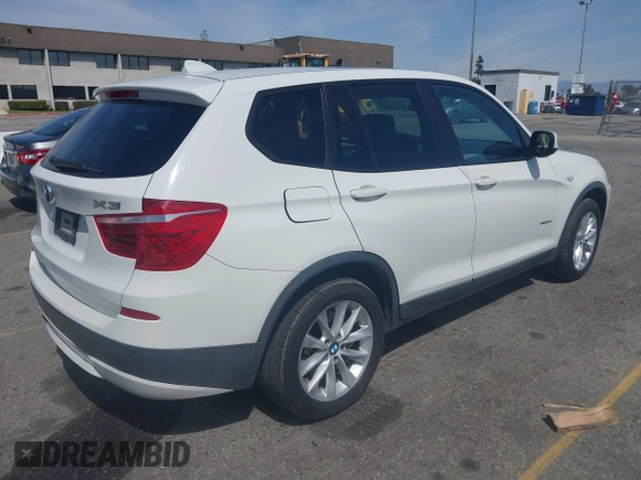 2014 BMW X3 xDrive28i with VIN 5UXWX9C51E0D09485, listed as a IAAI auction lot 41831582 with 103,953 mi miles and . Bid and sale history available at DreamBid. Image 4.
