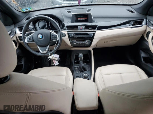 2018 BMW X1 xDrive28i z VIN WBXHT3C39J5L34133, wystawiony jako Copart lot #60195805 z przebiegiem 49 551 mil mil oraz Szkoda całkowita • Salvage title. Historia ofert i sprzedaży dostępna na DreamBid. Obrazek 8.