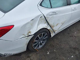 2019 Acura TLX z VIN 19UUB3F33KA007148, wystawiony jako IAAI lot #41889013 z przebiegiem 97 654 mil mil oraz . Historia ofert i sprzedaży dostępna na DreamBid. Obrazek 6.