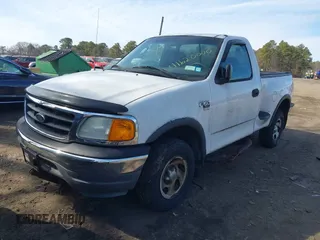 2004 Ford F-150 z VIN 2FTRF08W14CA09335, wystawiony jako IAAI lot #41620000 z przebiegiem 121 102 mil mil oraz . Historia ofert i sprzedaży dostępna na DreamBid. Obrazek 2.