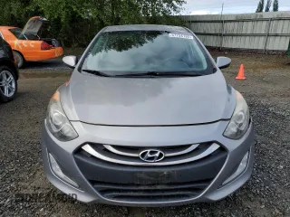 2013 Hyundai Elantra z VIN KMHD35LE3DU075234, wystawiony jako Copart lot #57754185 z przebiegiem 107 040 mil mil oraz Szkoda całkowita • Salvage title. Historia ofert i sprzedaży dostępna na DreamBid. Obrazek 5.