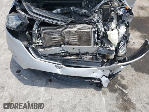 2019 Chevrolet Equinox LS z VIN 3GNAXHEV0KS551213, wystawiony jako Copart lot #55890995 z przebiegiem 86 527 mil mil oraz Nie do naprawy • Non repairable. Historia ofert i sprzedaży dostępna na DreamBid. Obrazek 12.