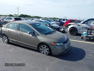 2006 Honda Civic LX with VIN 1HGFA16536L123283, listed as a IAAI auction lot 42710323 with 157,273 mi miles and . Bid and sale history available at DreamBid. Image 1.