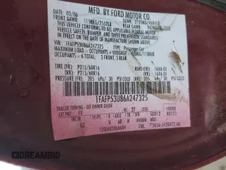 2006 Ford Taurus SE with VIN 1FAFP53U86A247325, listed as a Copart auction lot 58414025 with Not provided miles and Salvage title. Bid and sale history available at DreamBid. Image 12.