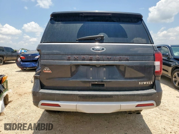 2022 Ford Expedition Timberline with VIN 1FMJU1RT5NEA18012, listed as a Copart auction lot 61226845 with 105,464 mi miles and Salvage title. Bid and sale history available at DreamBid. Image 6.