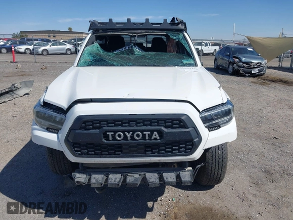 2021 Toyota Tacoma SR с VIN 3TYCZ5AN3MT052496, выставлен на аукционе IAAI как лот 41999250 с пробегом 76 194 миль миль и . История ставок и продаж доступна на DreamBid. Изображение 6.