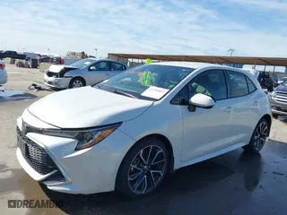 2019 Toyota Corolla Hatchback SE with VIN JTNK4RBEXK3059838, listed as a IAAI auction lot 41794822 with 139,199 mi miles. Bid and sale history available at carsss.com. Image 19.