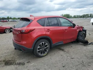 2016 Mazda CX-5 Grand Touring with VIN JM3KE4DY0G0664379, listed as a Copart auction lot 54659005 with 116,022 mi miles and Salvage Title. Bid and sale history available at DreamBid. Image 3.