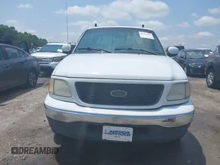 2001 Ford F-150 XLT with VIN 1FTRW07L91KB77612, listed as a IAAI auction lot 42432387 with 106,574 mi miles and . Bid and sale history available at DreamBid. Image 12.